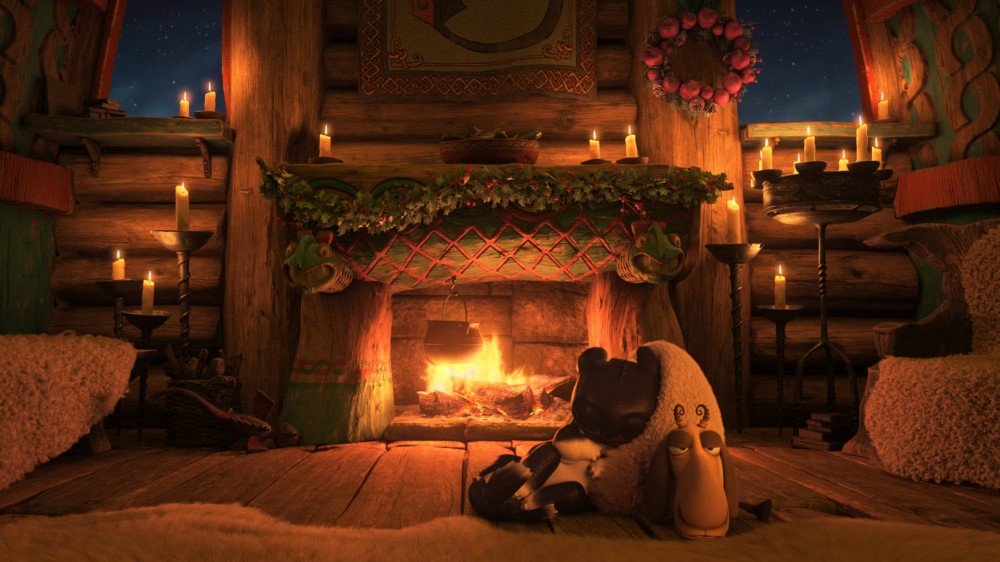 Un dragon dormant sur un mouton devant un feu.