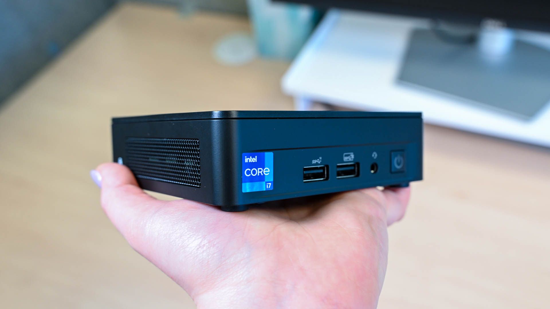 Someone holding the Intel NUC 13 Pro.