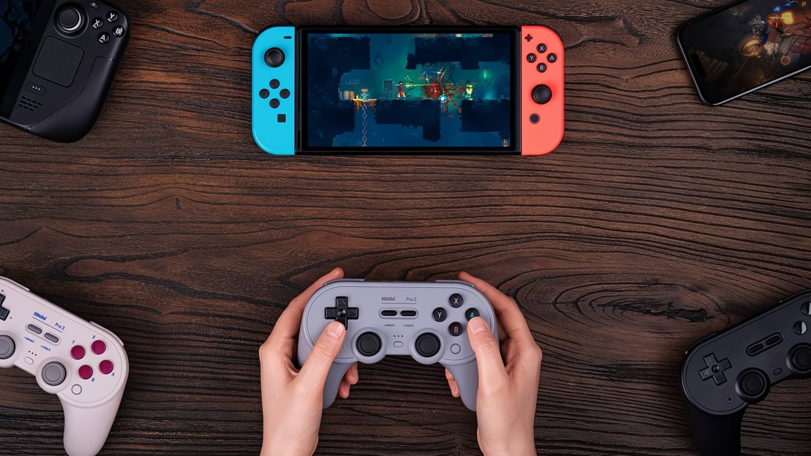 A 8Bitdo Pro 2 Wireless Bluetooth Controller being used to play a Nintendo Switch 2 on a wooden desk, other models are nearby with other consoles they can play