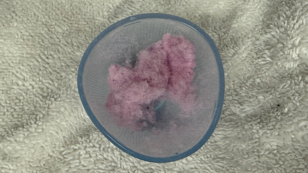 Peluches pour rasoir en tissu Philips série 1000 dans un récipient